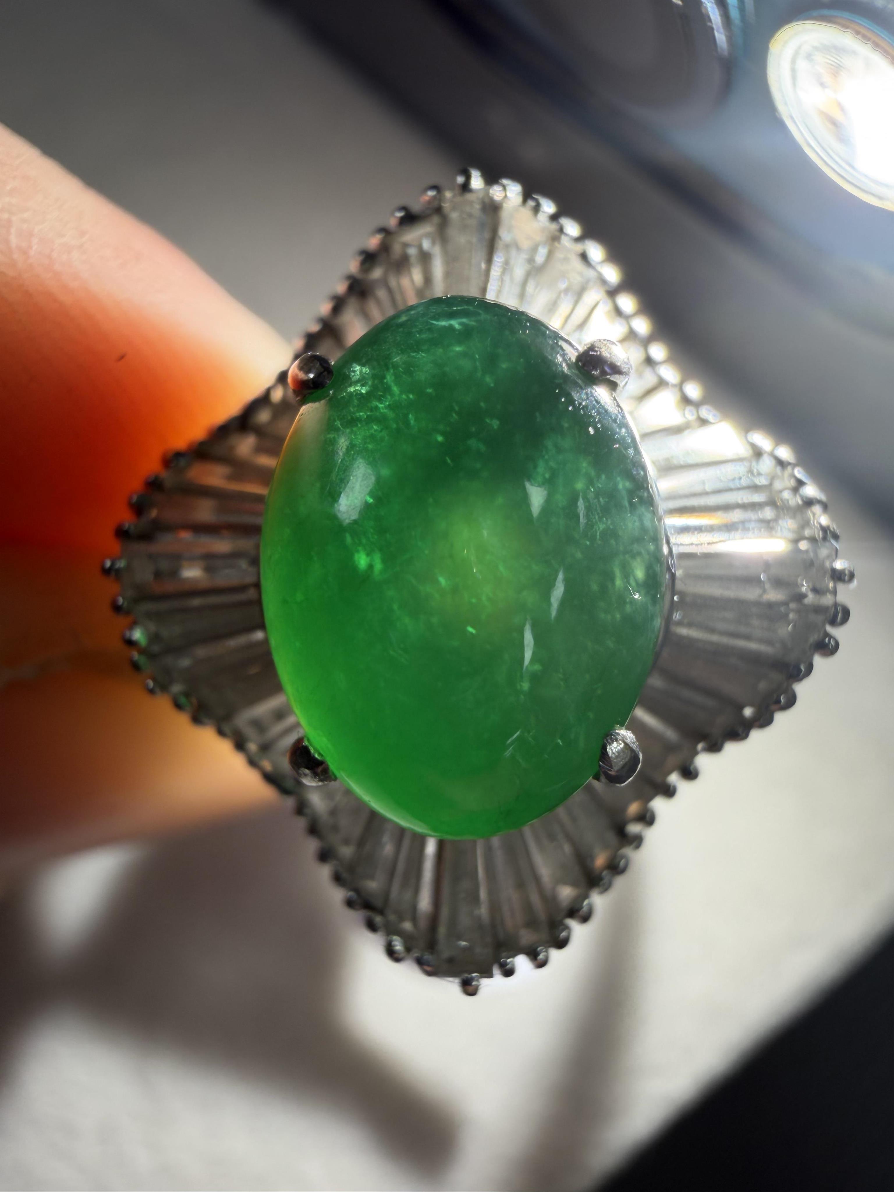 A fine jadeite and diamond ring